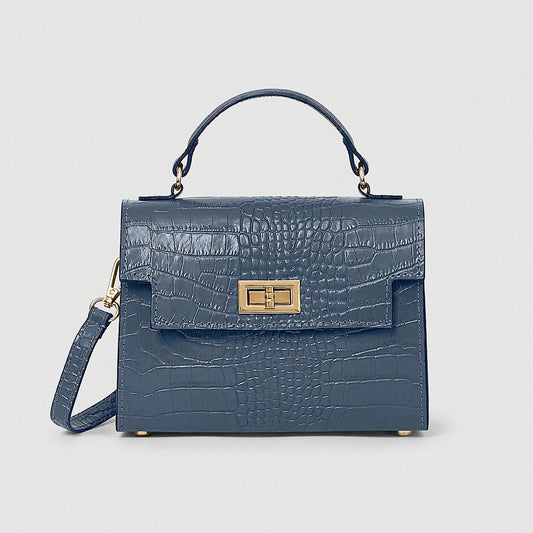 Dusty Blue Margot Croc crossbody bag, studio product photo on grey background