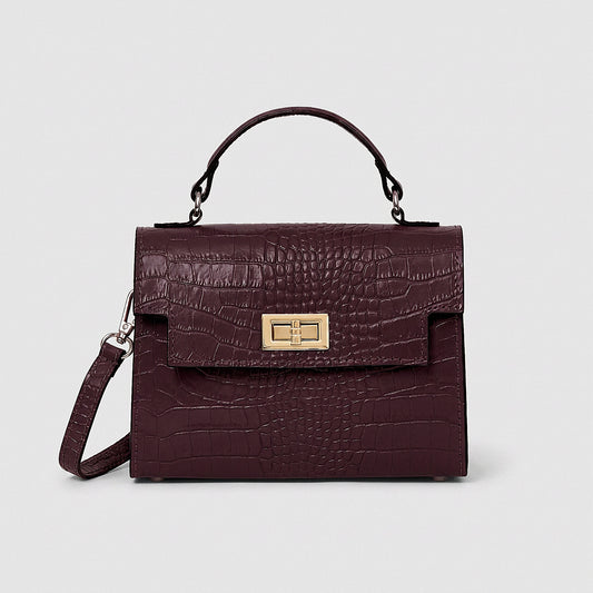Aubergine Margot Croc crossbody bag, studio product photo on grey background