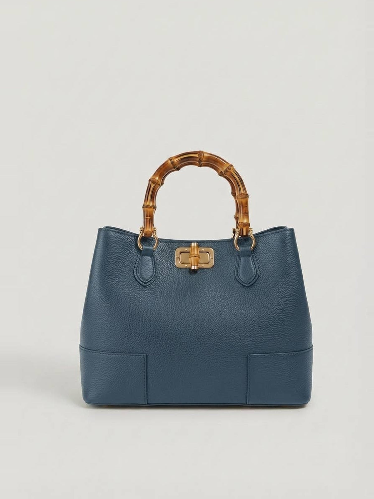 Ginevra Bamboo-Handle Leather Bag by Clemés in Slate Blue, three-quarter studio shot on grey background