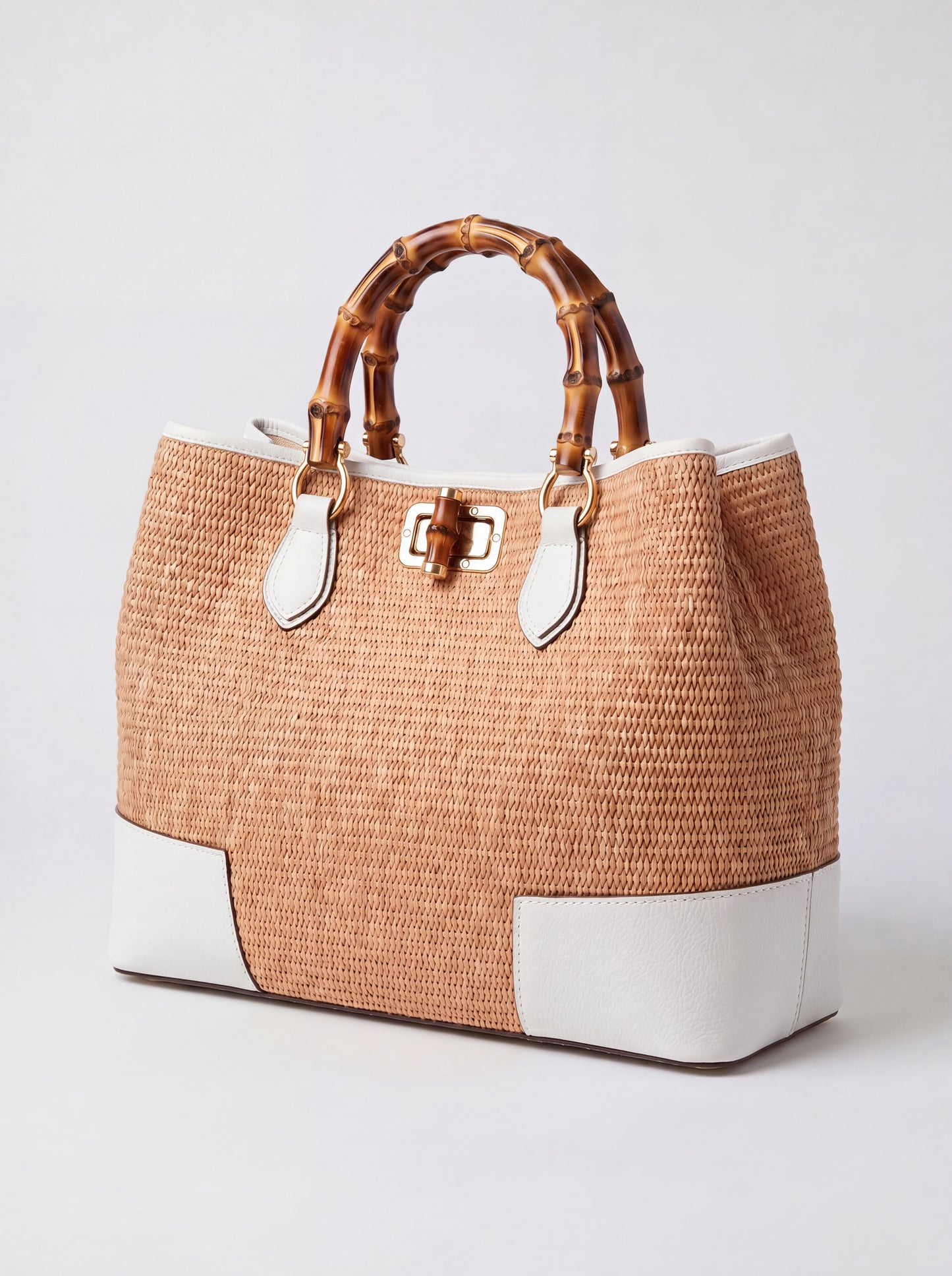 Ginevra Bamboo-Handle Raffia Bag by Clemés in White, three-quarter studio shot on grey background
