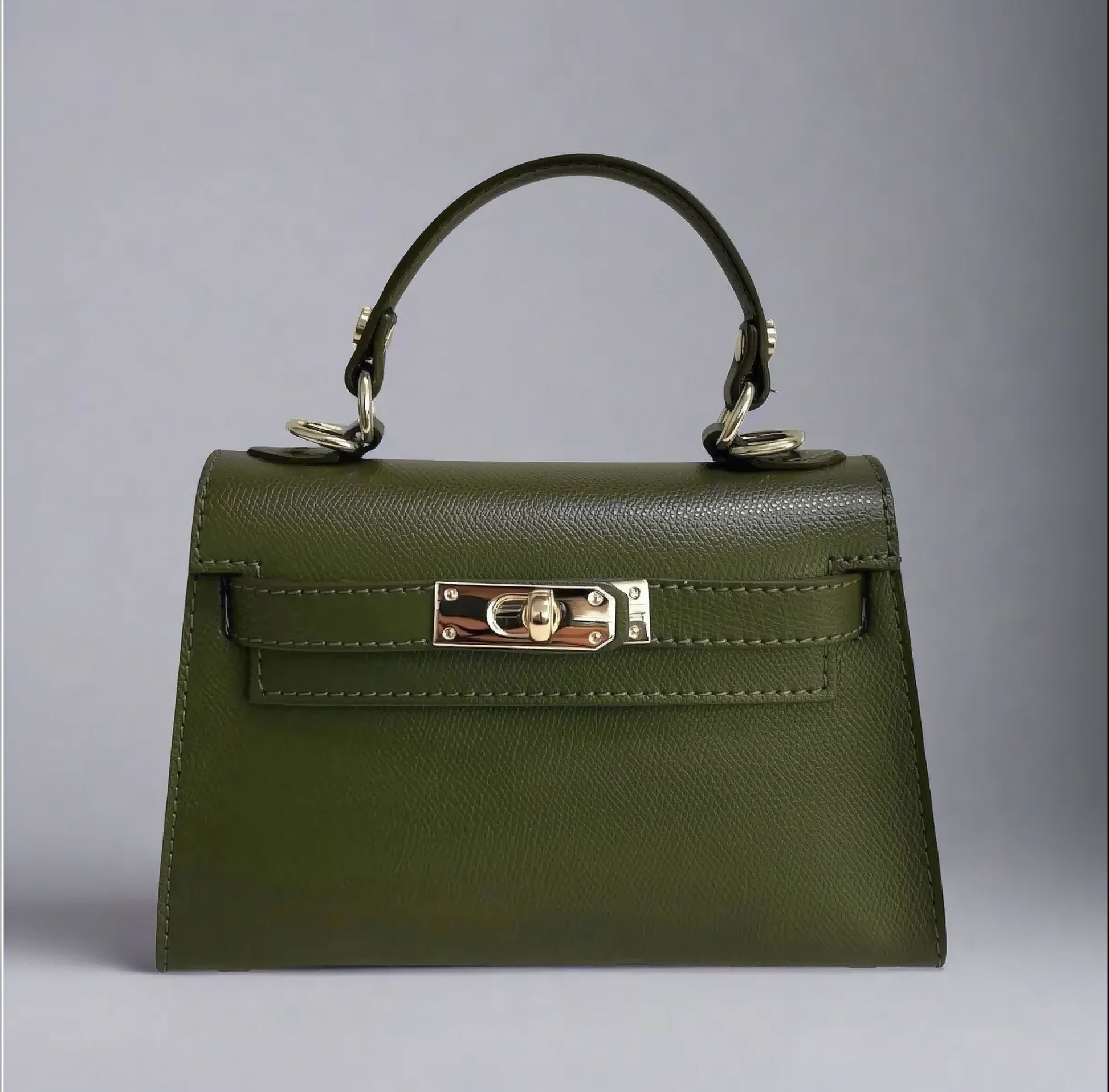 The Mini Kelly-Inspired Epsom Leather Handbag by Clemés in Olive, three-quarter studio shot on grey background