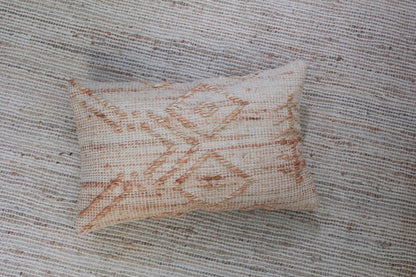 Rust Patchwork Jute Lumbar Cushion flat lay
