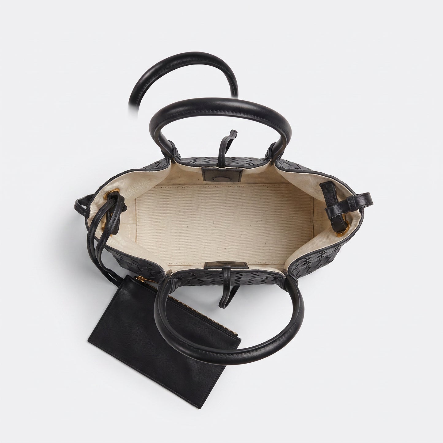 Ornella woven leather bag open flat-lay from above with coin purse