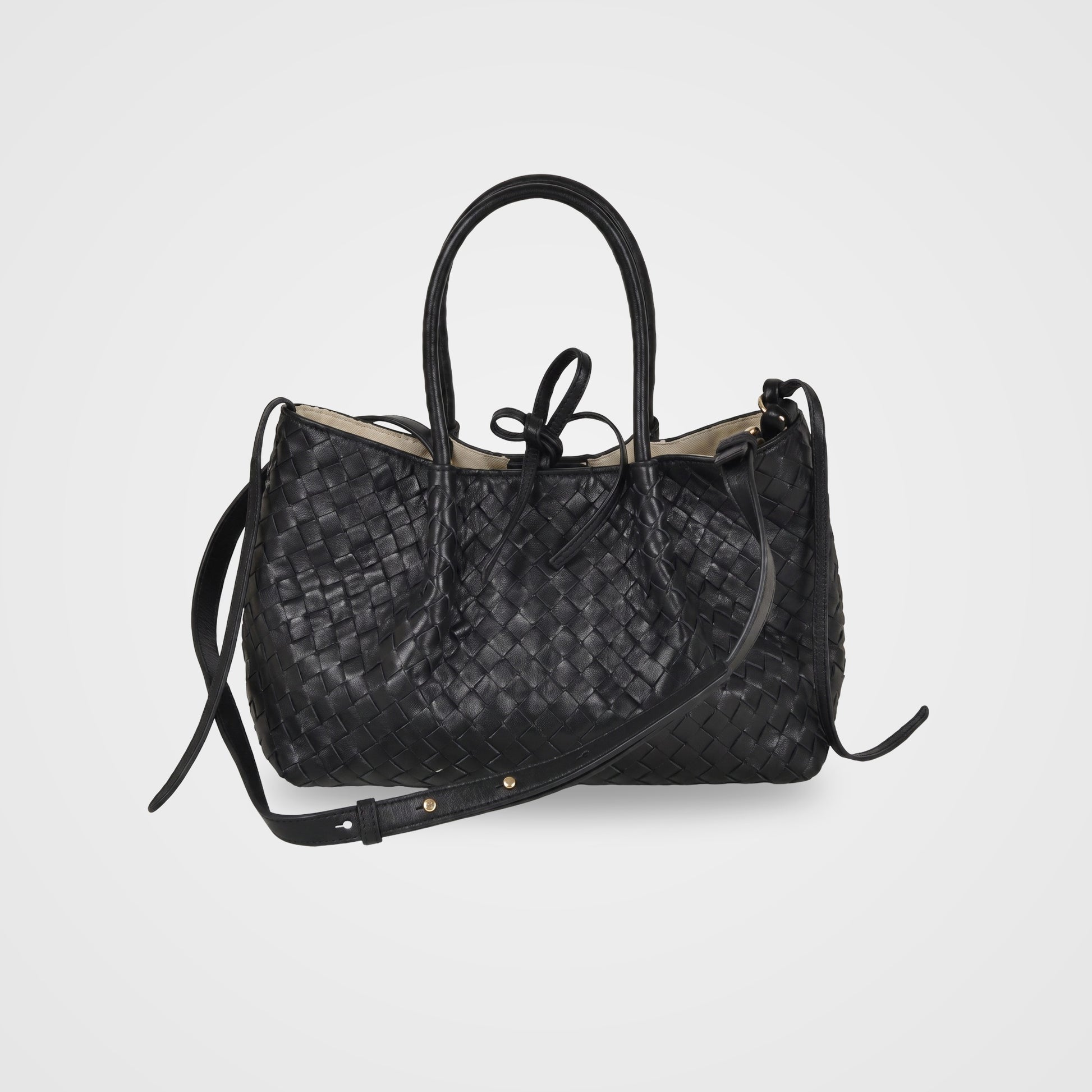 Ornella woven leather bag by Clemés in Black with shoulder strap