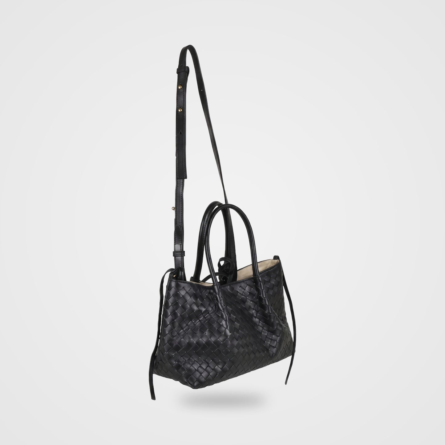 Ornella woven leather bag in Black worn crossbody with detachable strap