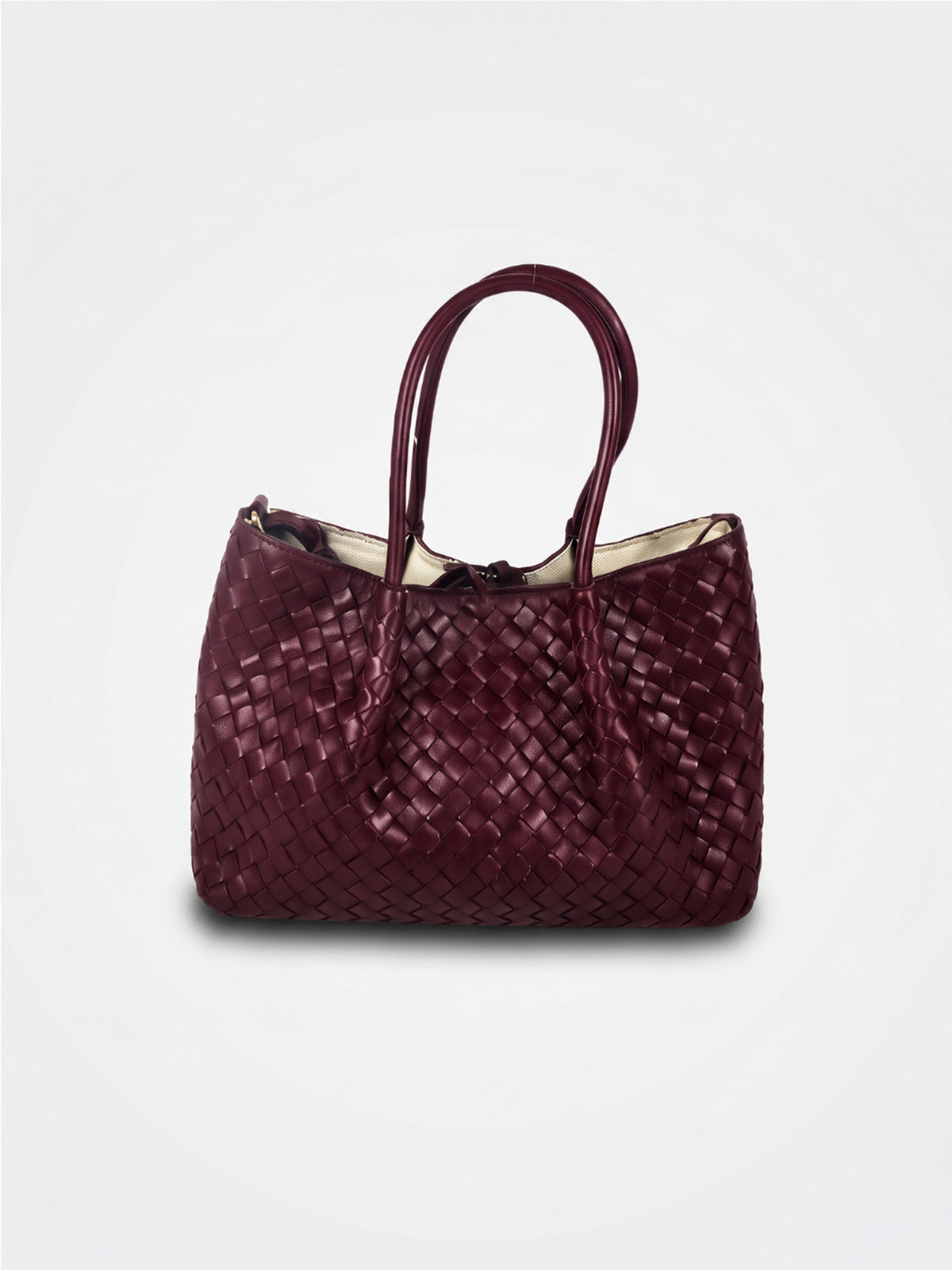 Ornella woven leather bag by Clemés in Burgundy, professional studio shot with contact shadow