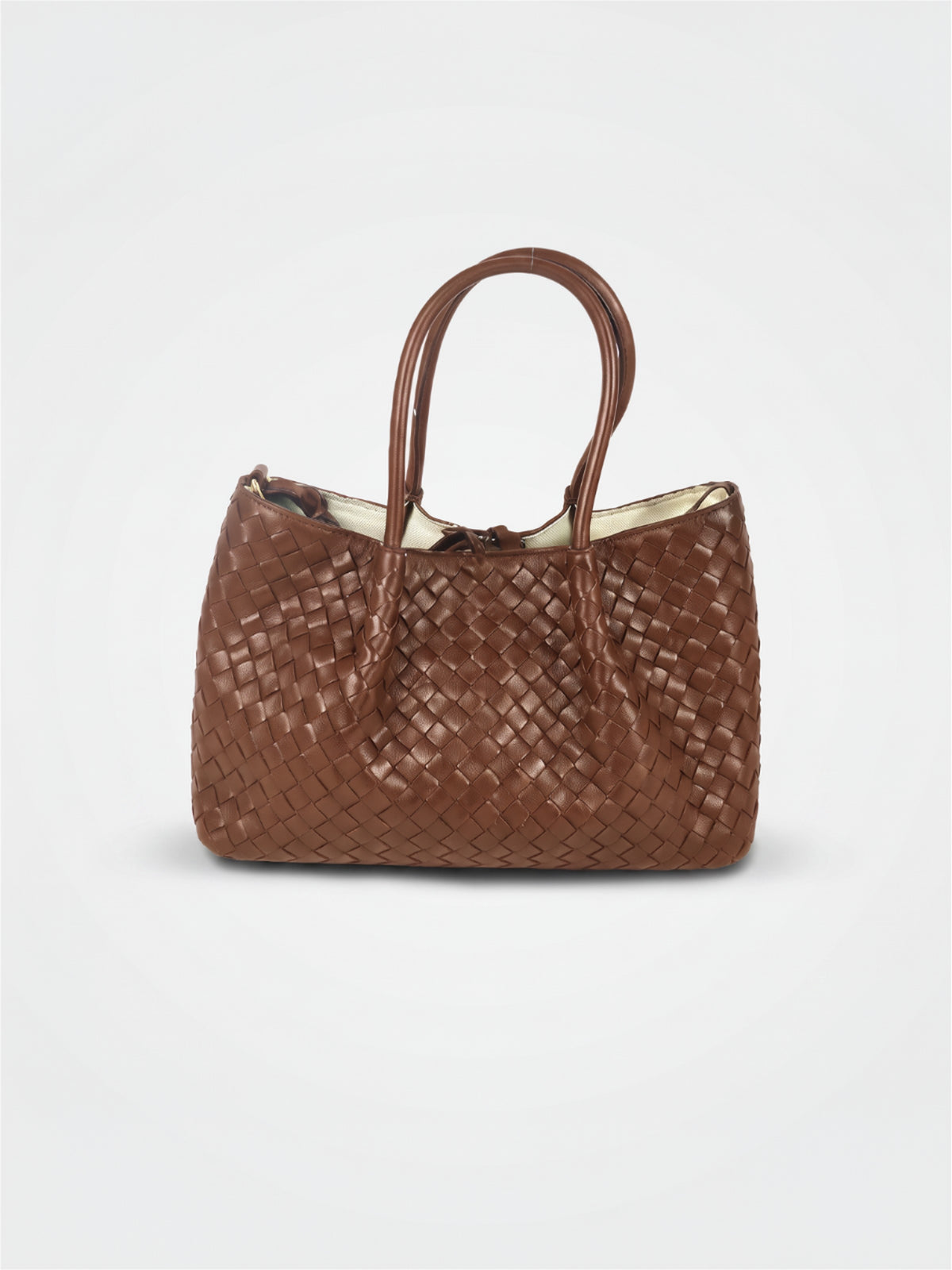 Ornella Medium Woven Leather Bag by Clemés in Dark Tan, studio shot