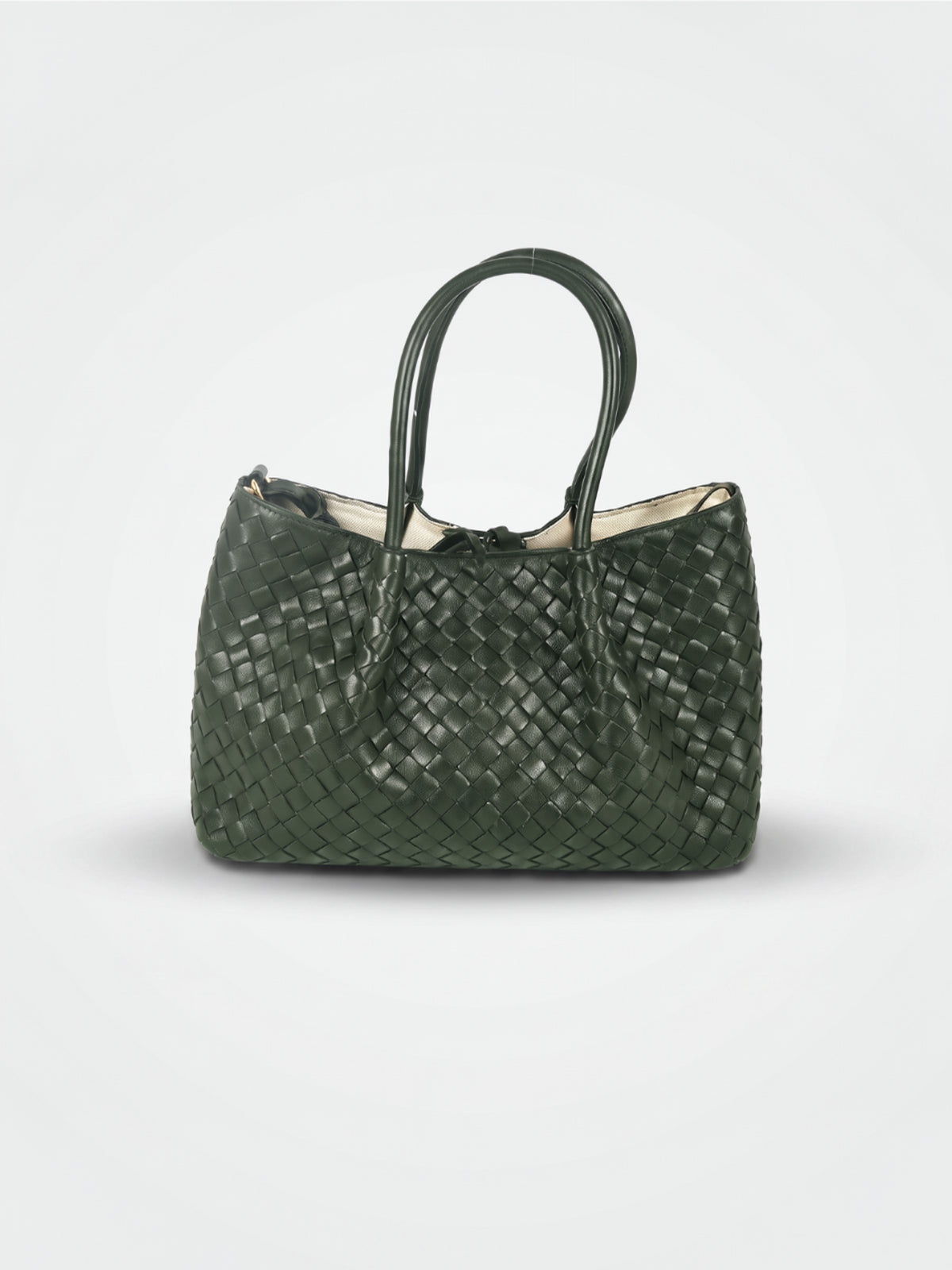 Ornella woven leather bag by Clemés in Forest Green, professional studio shot with contact shadow