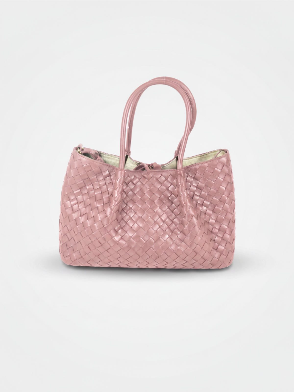 Ornella woven leather bag by Clemés in Pink, professional studio shot with contact shadow