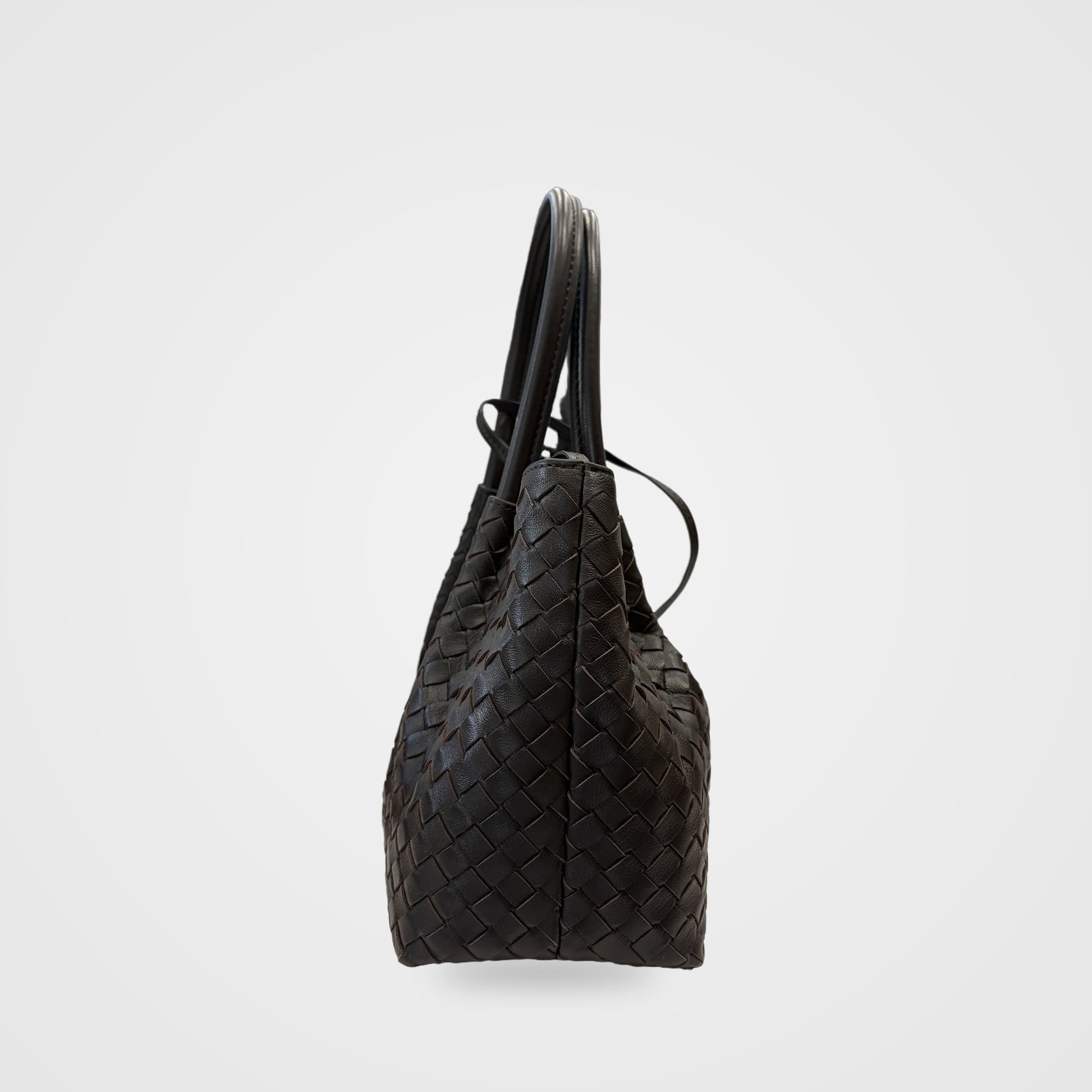 Ornella woven leather bag side profile showing depth