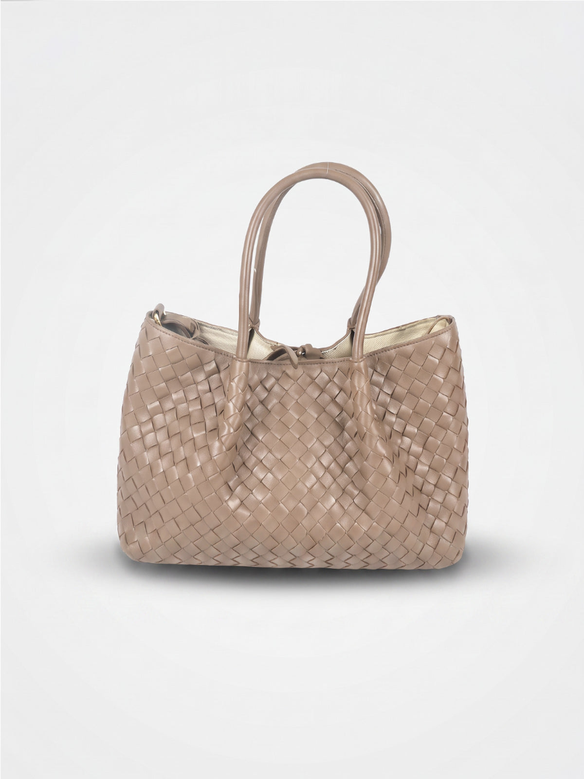 Ornella woven leather bag by Clemés in Taupe, professional studio shot with contact shadow