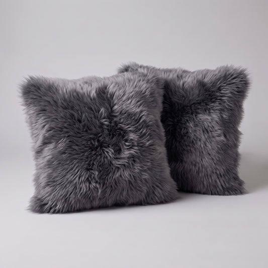 Pair of Dover double-sided New Zealand sheepskin cushion covers, 35 x 35 cm, side by side