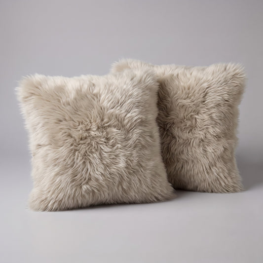 Pair of Oyster double-sided New Zealand sheepskin cushion covers, 35 x 35 cm, side by side