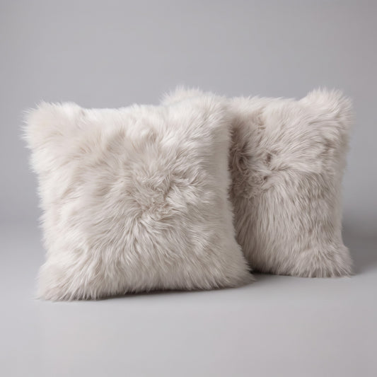 Pair of Oyster New Zealand sheepskin cushion covers, 35 x 35 cm, side by side