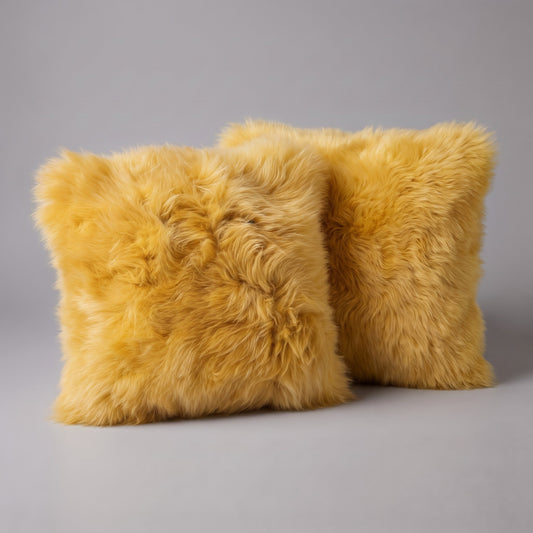 Pair of Squash New Zealand sheepskin cushion covers, 35 x 35 cm, side by side