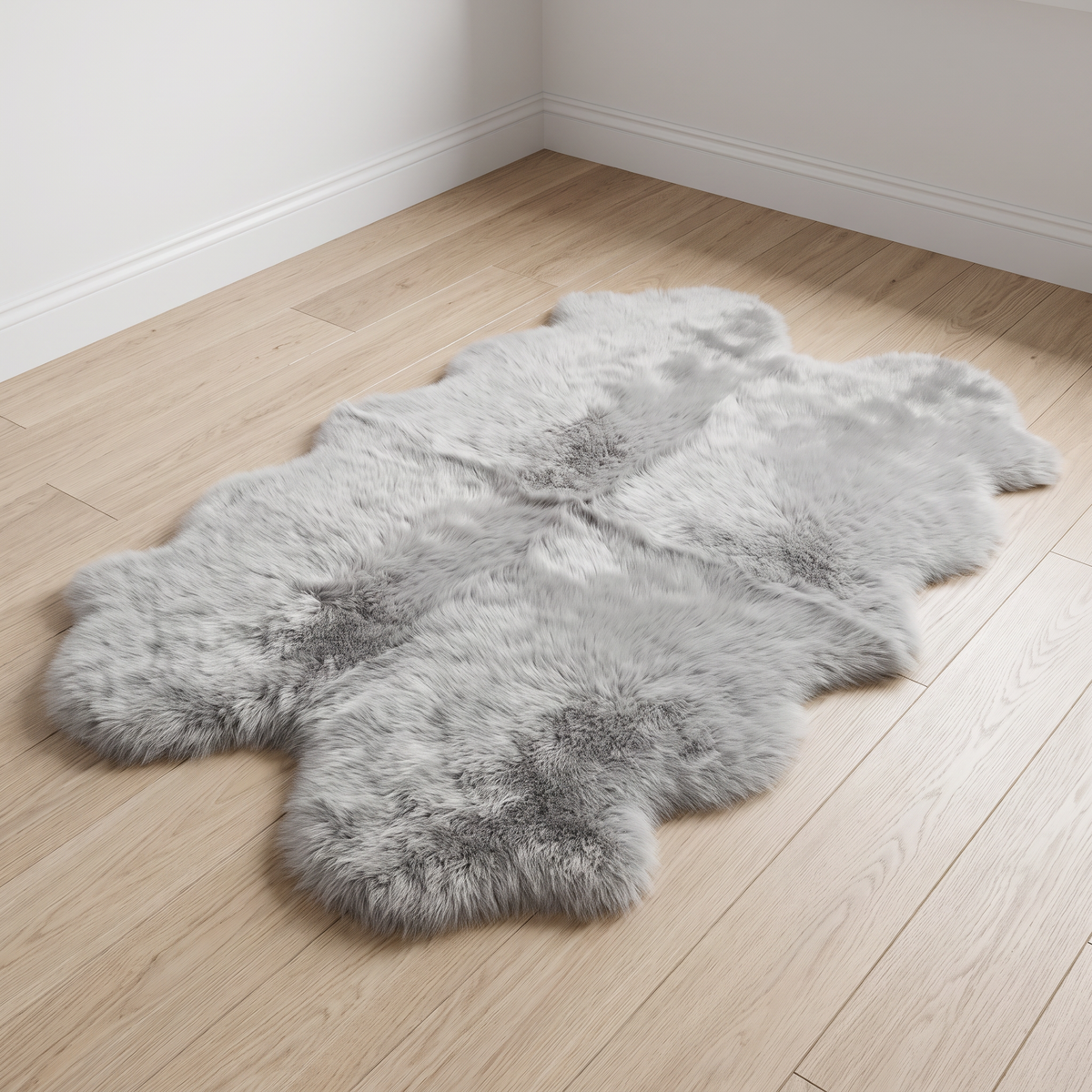 Quad New Zealand Sheepskin Rug & Throw in Light Grey on wood floor