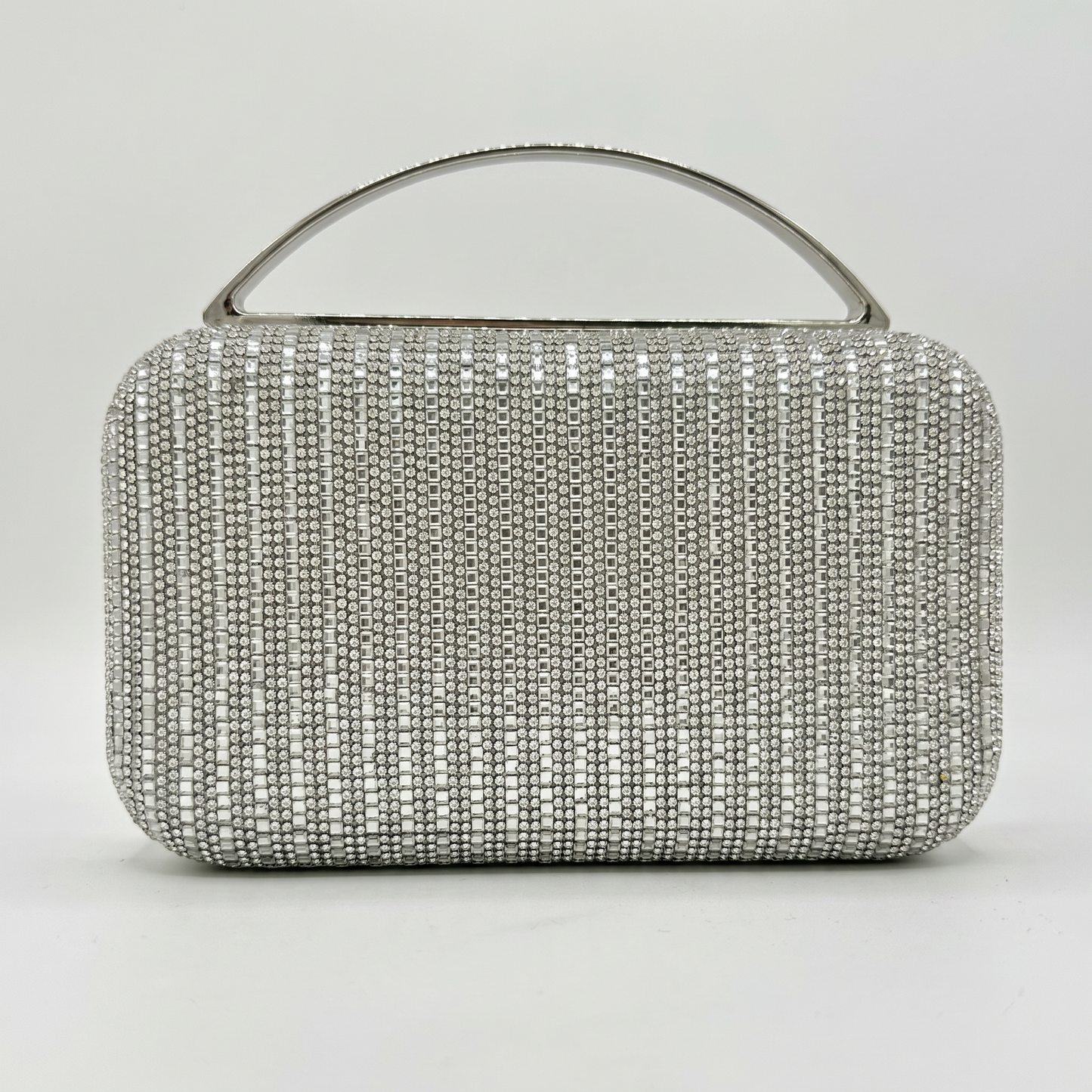 Odette Crystal Minaudière Clutch by Clemés in Silver on light grey studio background