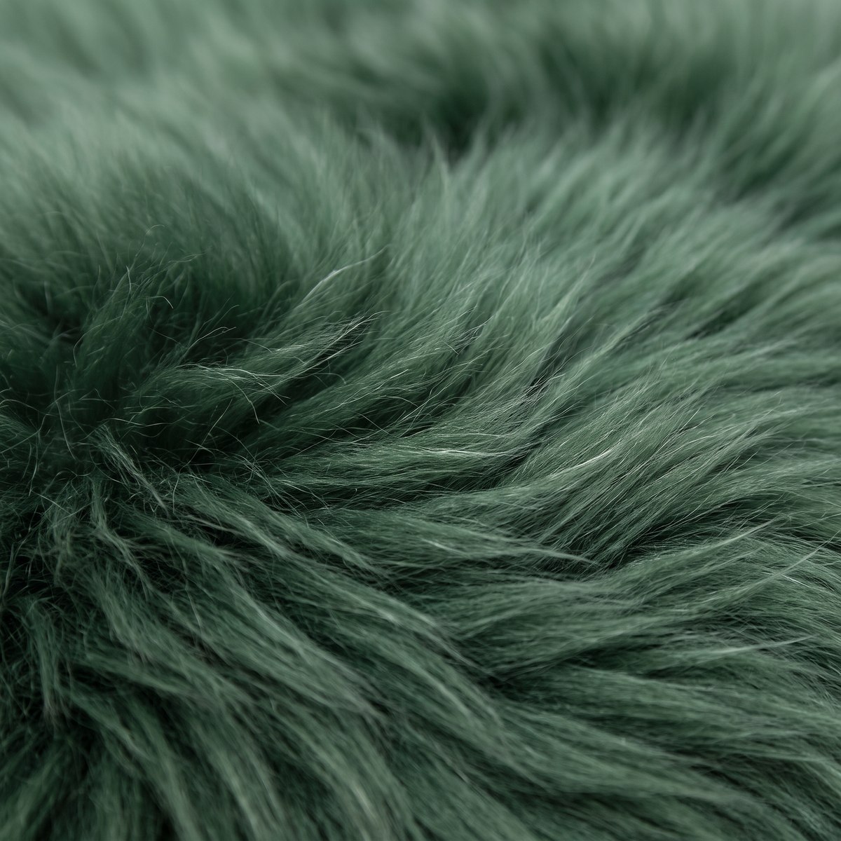 Close-up of Jungle Green long wool sheepskin fibres