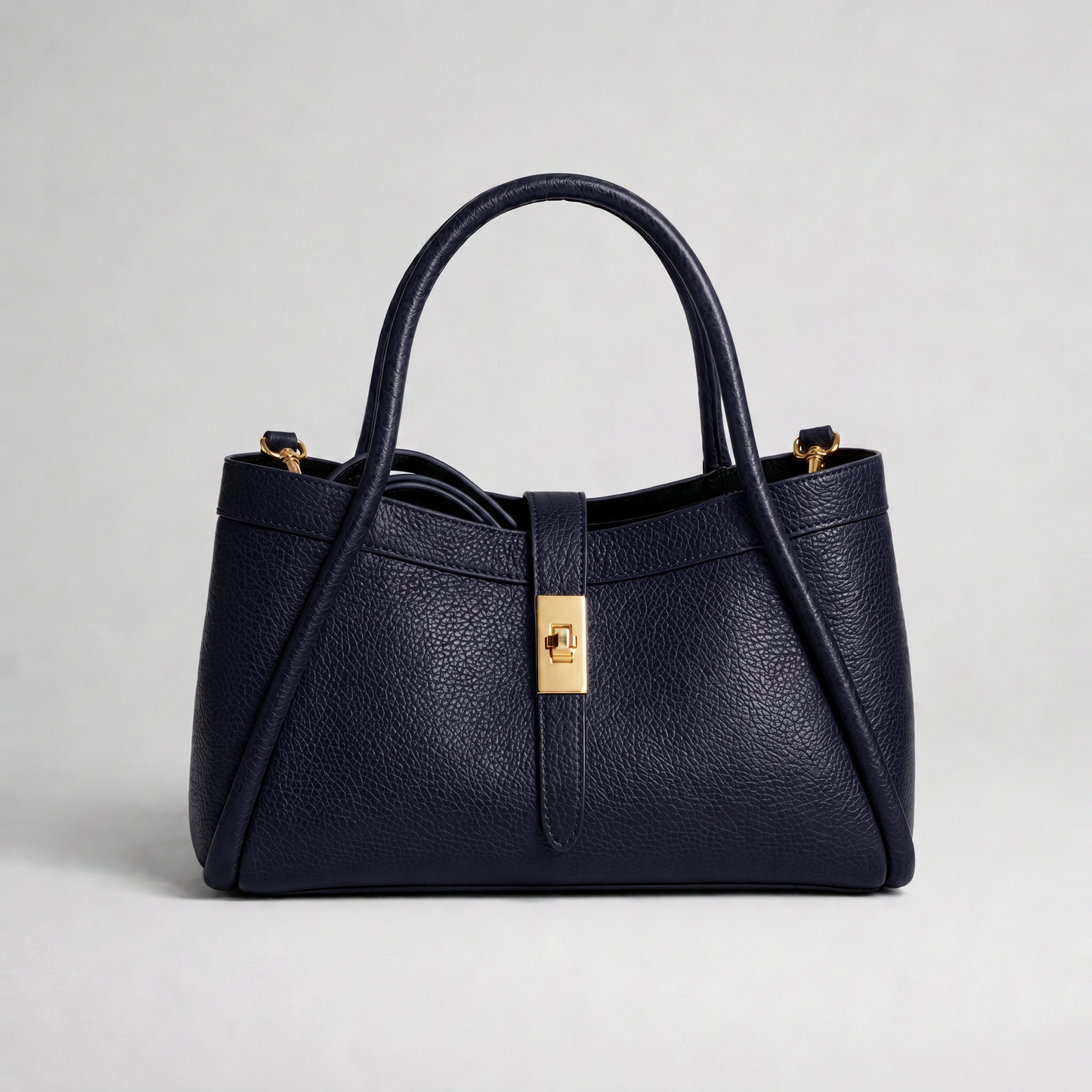 Margot Leather Tote Bag in Navy on light grey studio background
