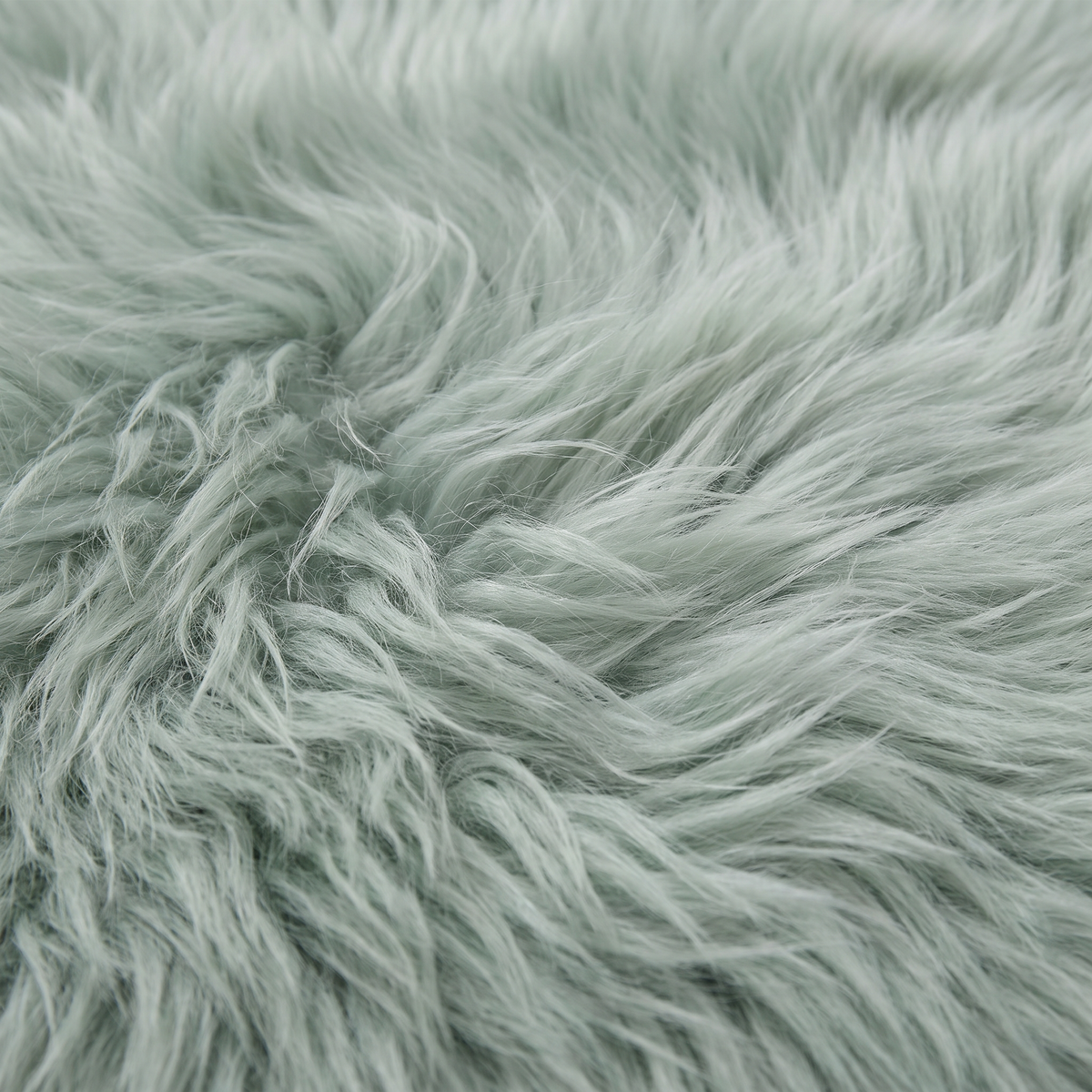 Close-up of Sage green long wool sheepskin fibres