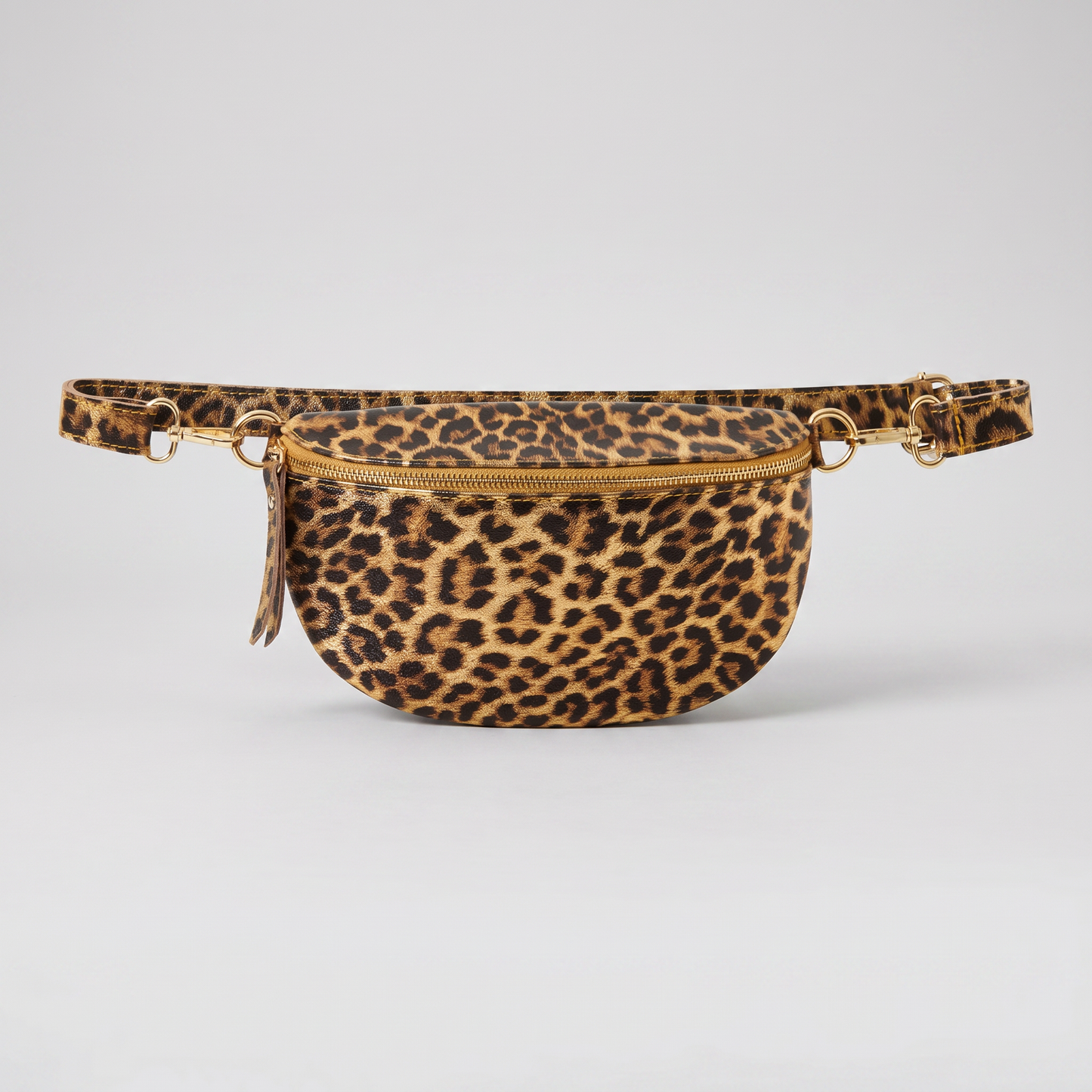 Romy Leopard Crossbody Bum Bag in Golden Leopard on light grey studio background