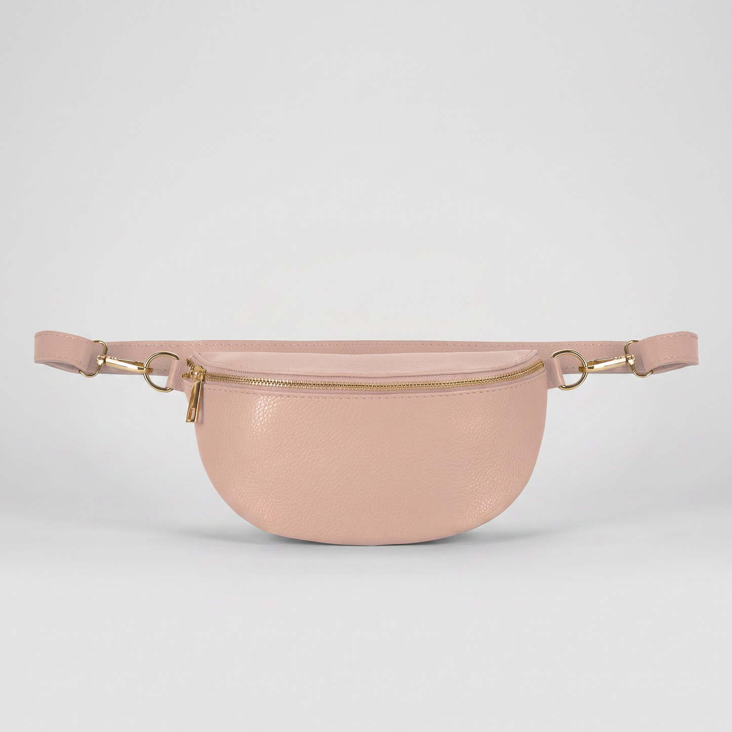 Romy leather crossbody bum bag in Smoke Rose on light grey studio background