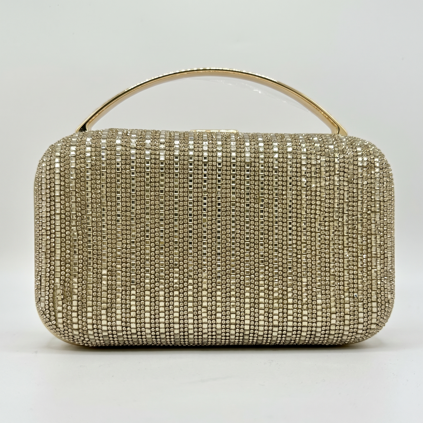 Odette Crystal Minaudière Clutch by Clemés in Gold on light grey studio background