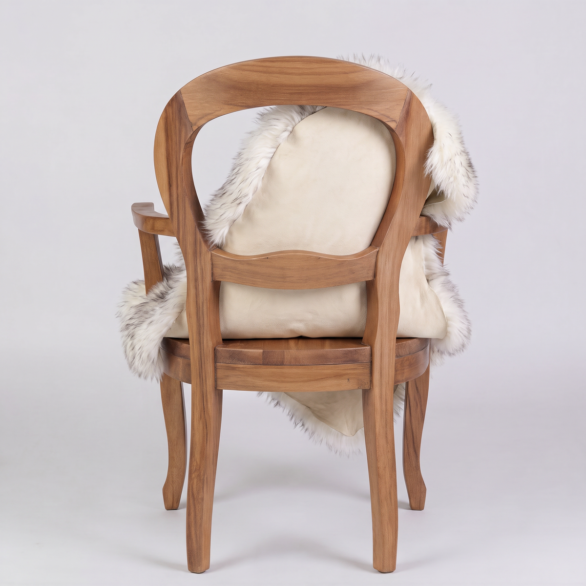 Twilight sheepskin over an armchair back, suede leather underside facing the camera