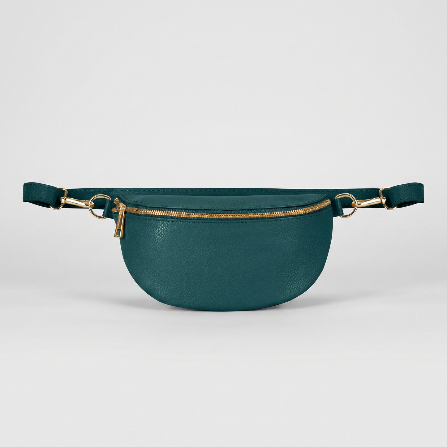 Romy leather crossbody bum bag in Dark Teal on light grey studio background