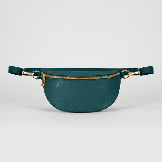 Romy leather crossbody bum bag in Dark Teal on light grey studio background