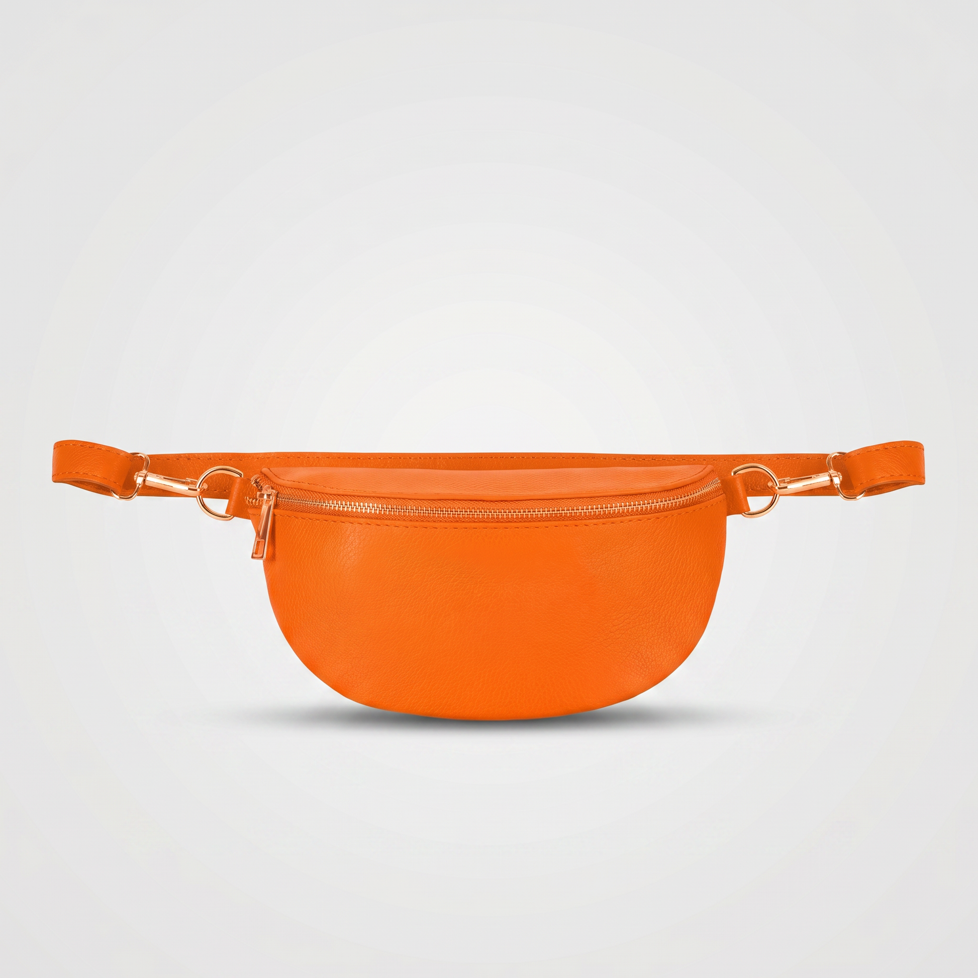 Romy leather crossbody bum bag in Orange on light grey studio background