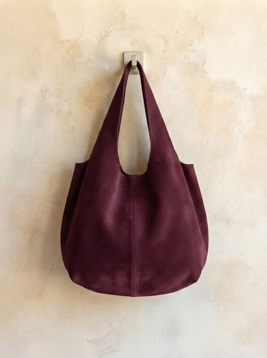 Giannina suede leather shoulder tote by Clemés in Mulberry, hanging main product shot