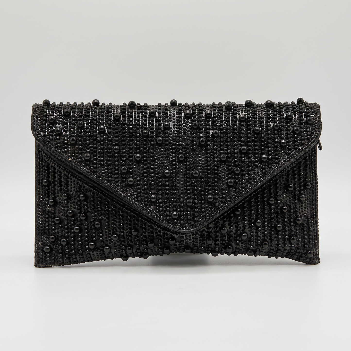 Perlette Pearl & Crystal Envelope Clutch by Clemés in Black on light grey studio background