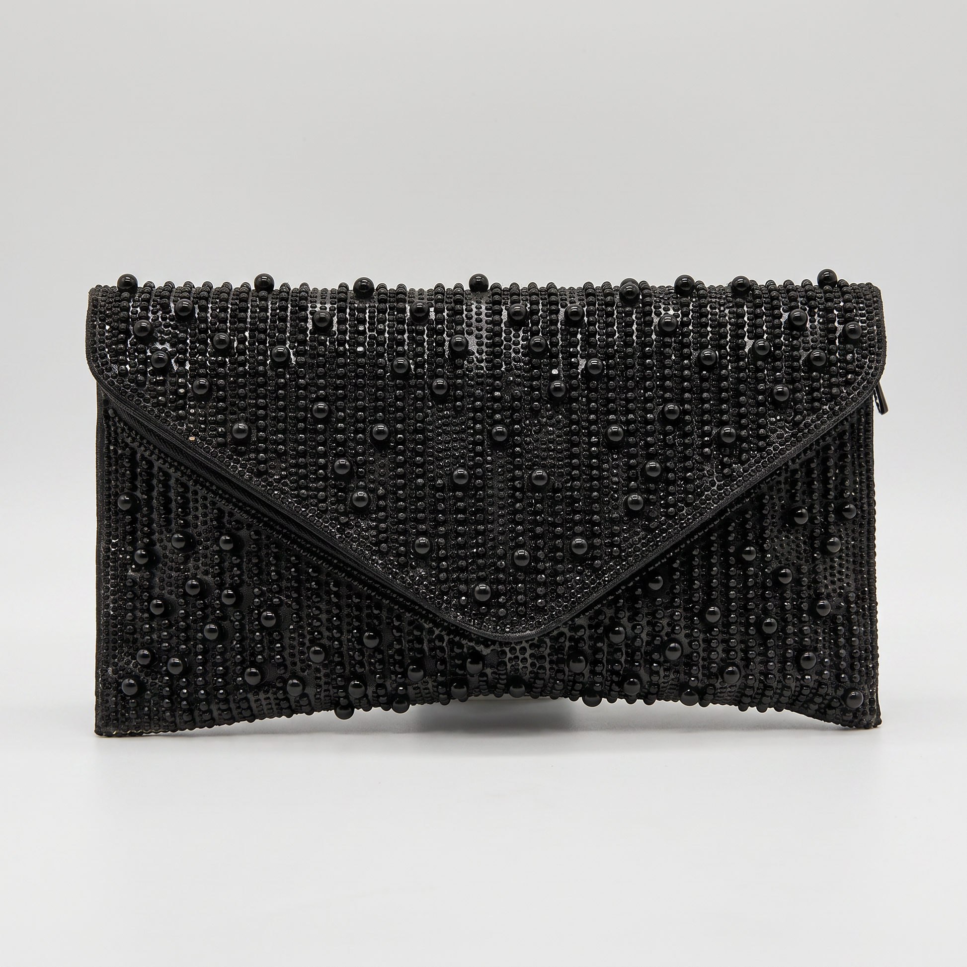 Perlette Pearl & Crystal Envelope Clutch by Clemés in Black on light grey studio background