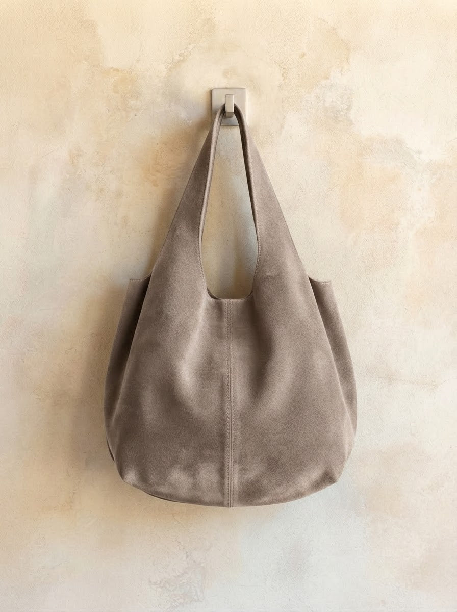 Giannina suede leather shoulder tote by Clemés in Taupe, hanging main product shot