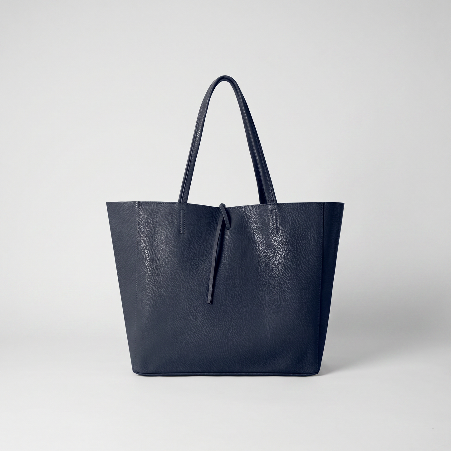 Carlotta Oversized Leather Tote in Navy on light grey studio background