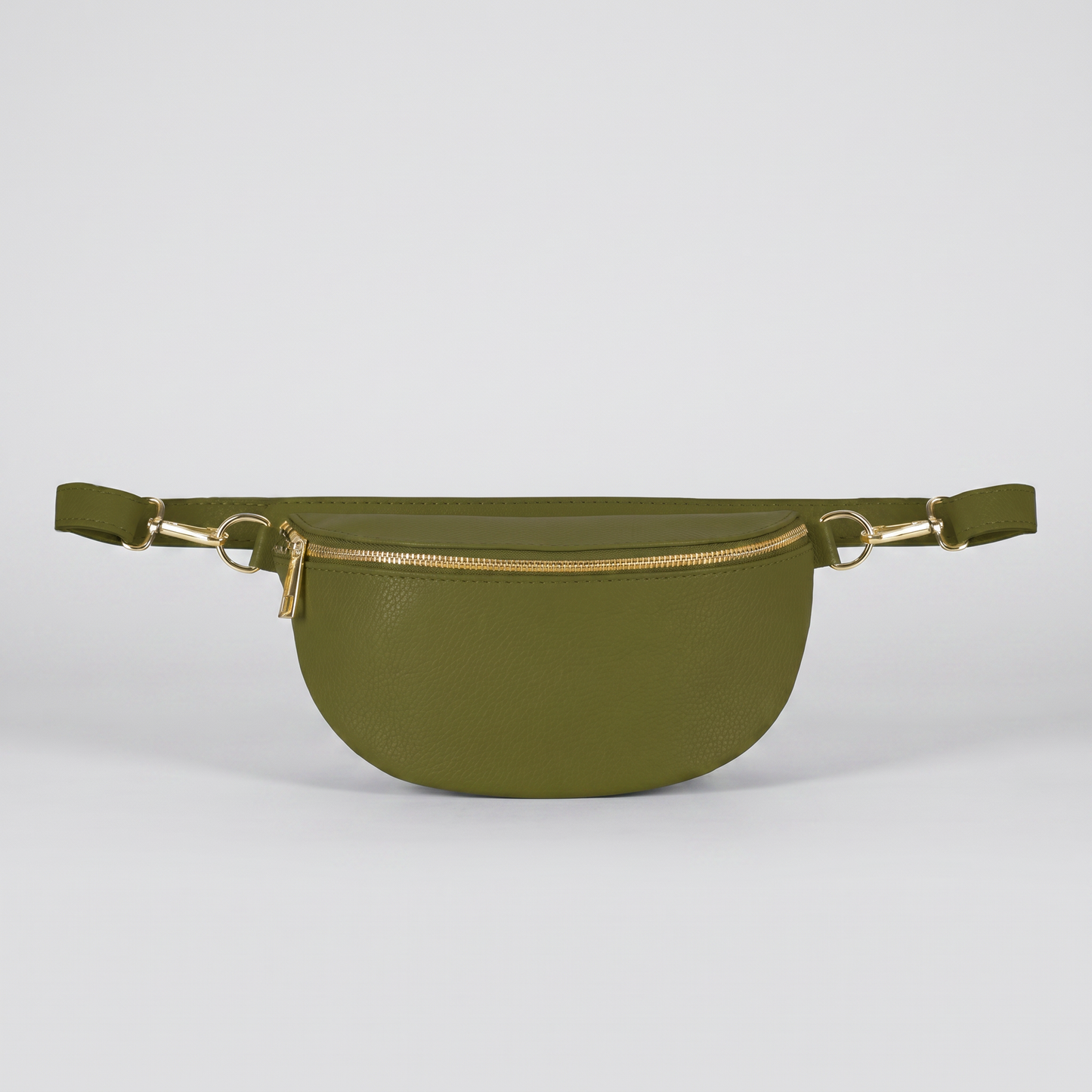 Romy leather crossbody bum bag in Olive on light grey studio background