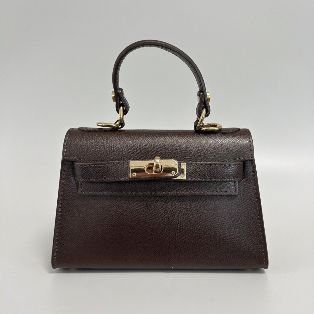 Dark Chocolate Mini Kelly leather handbag, grey studio