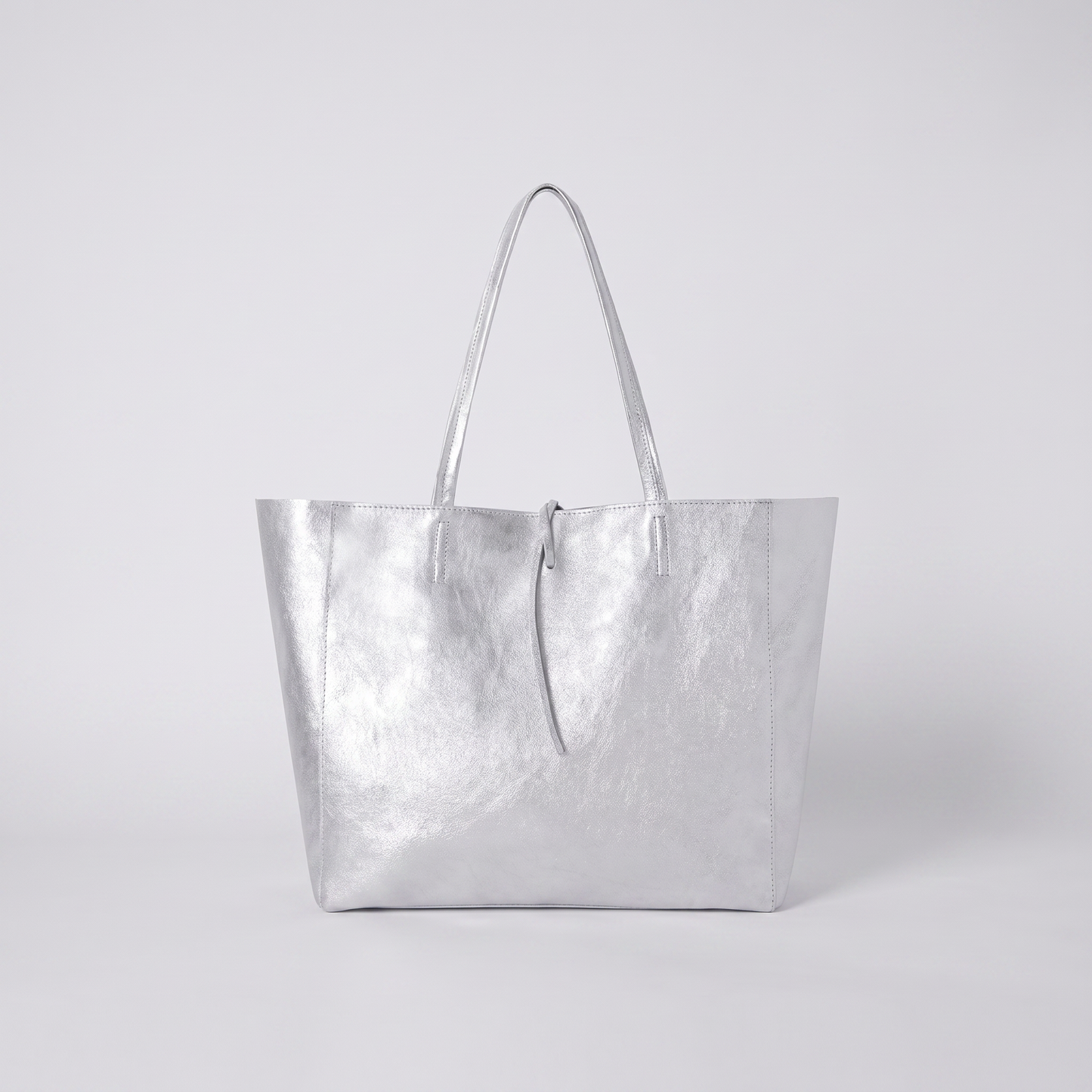 Carlotta Oversized Leather Tote in Silver on light grey studio background