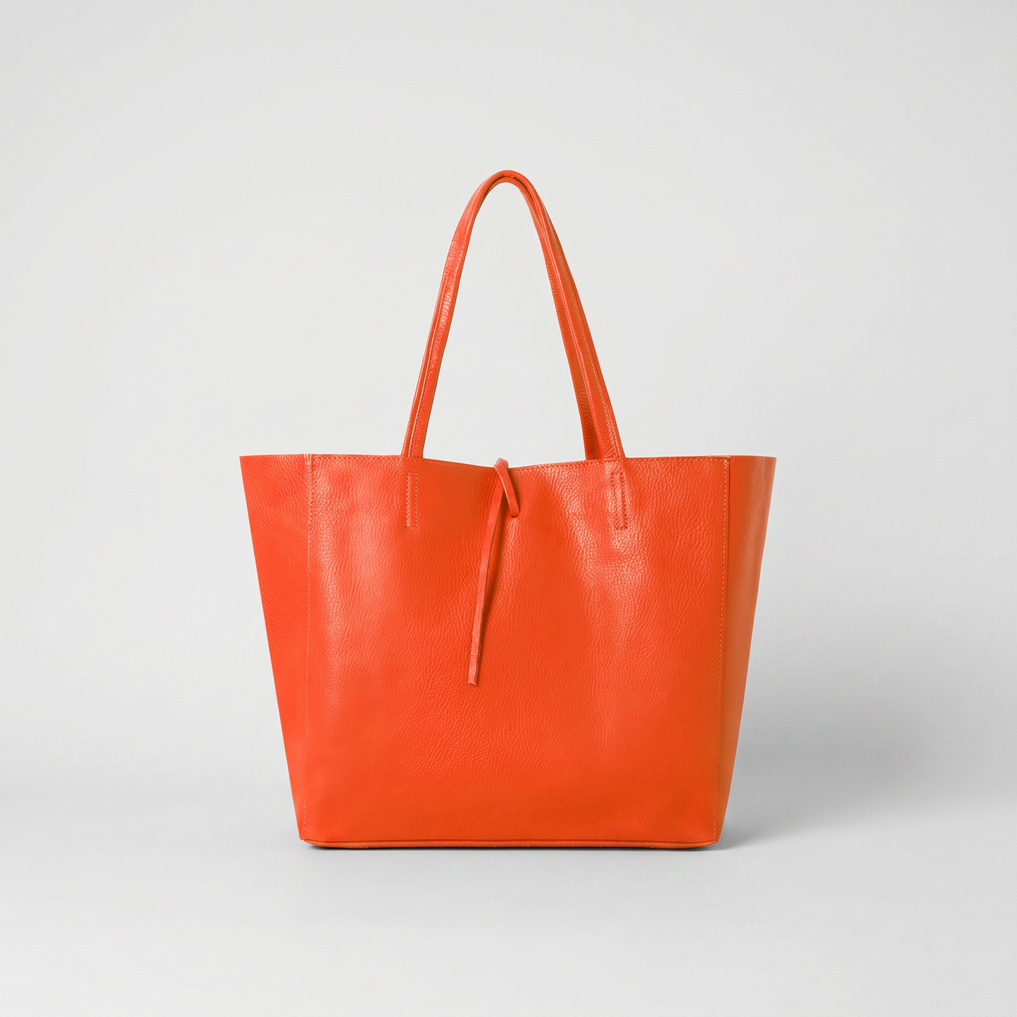 Carlotta Oversized Leather Tote in Burnt Orange on light grey studio background
