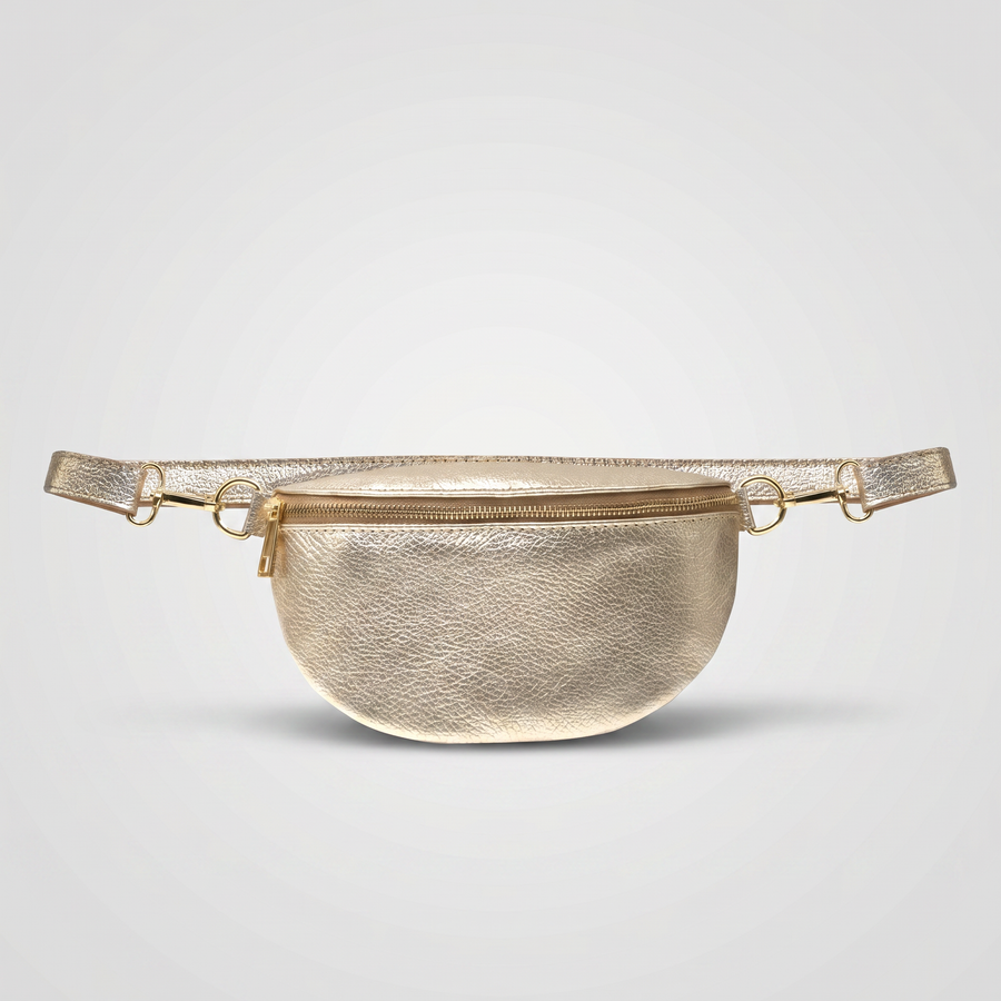 Romy leather crossbody bum bag in Gold on light grey studio background